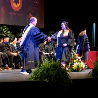 More than 1,000 students graduate from South College, including four-time cancer survivor through Competency-Based Education (CBE) program