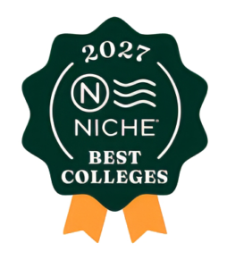 A green badge with yellow ribbons reads “2027 Niche Best Colleges” in white text, featuring the Niche logo with a stylized “N” and three wavy lines.